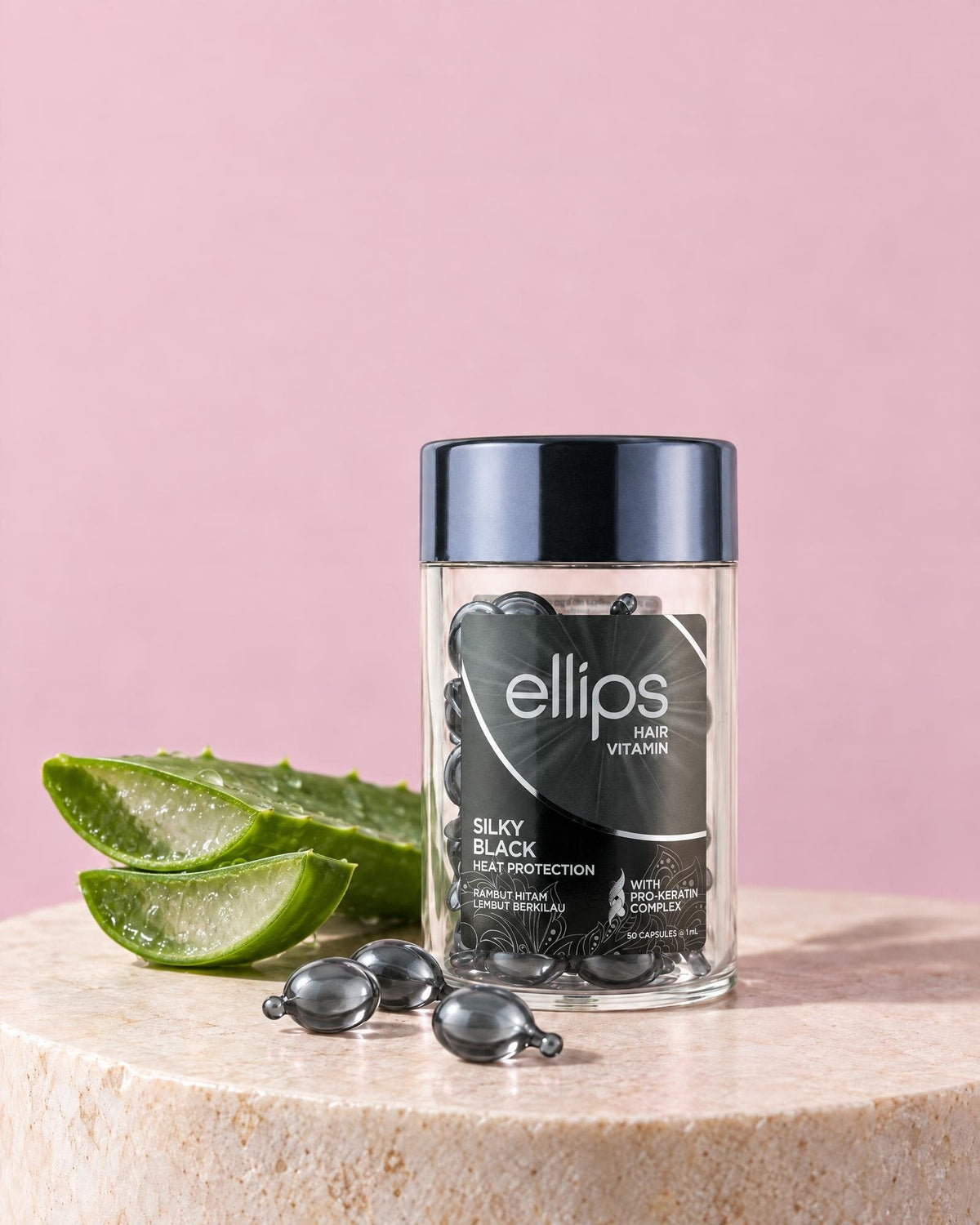 En burk Ellips Silky Black med de viktigaste ingredienserna