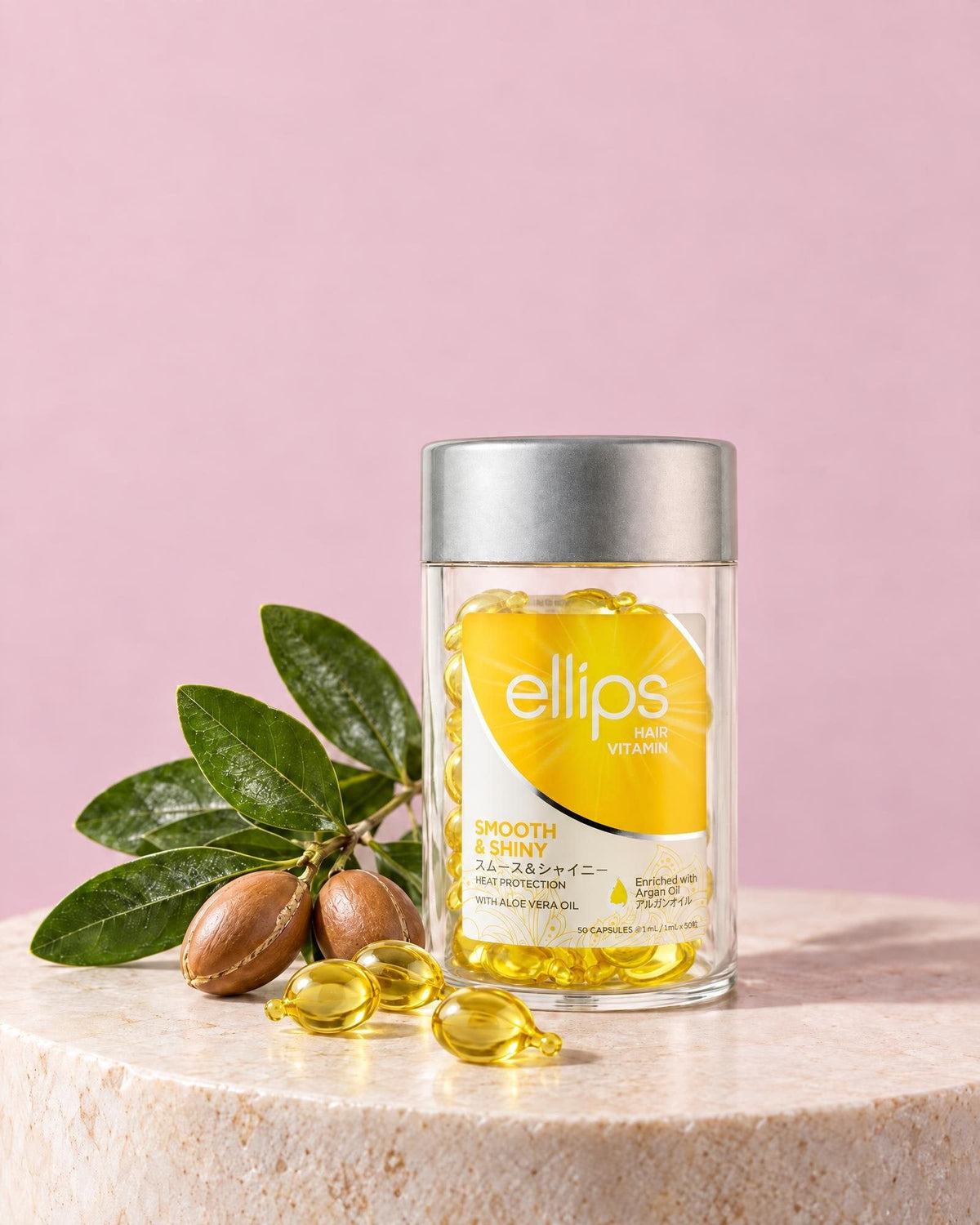 En burk Ellips Smooth & Shiny med de viktigaste ingredienserna